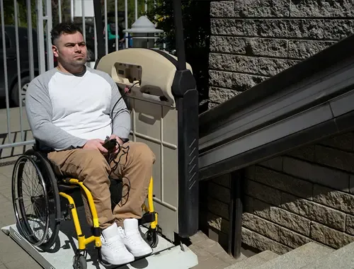 A wheelchair platform lift at a home entrance